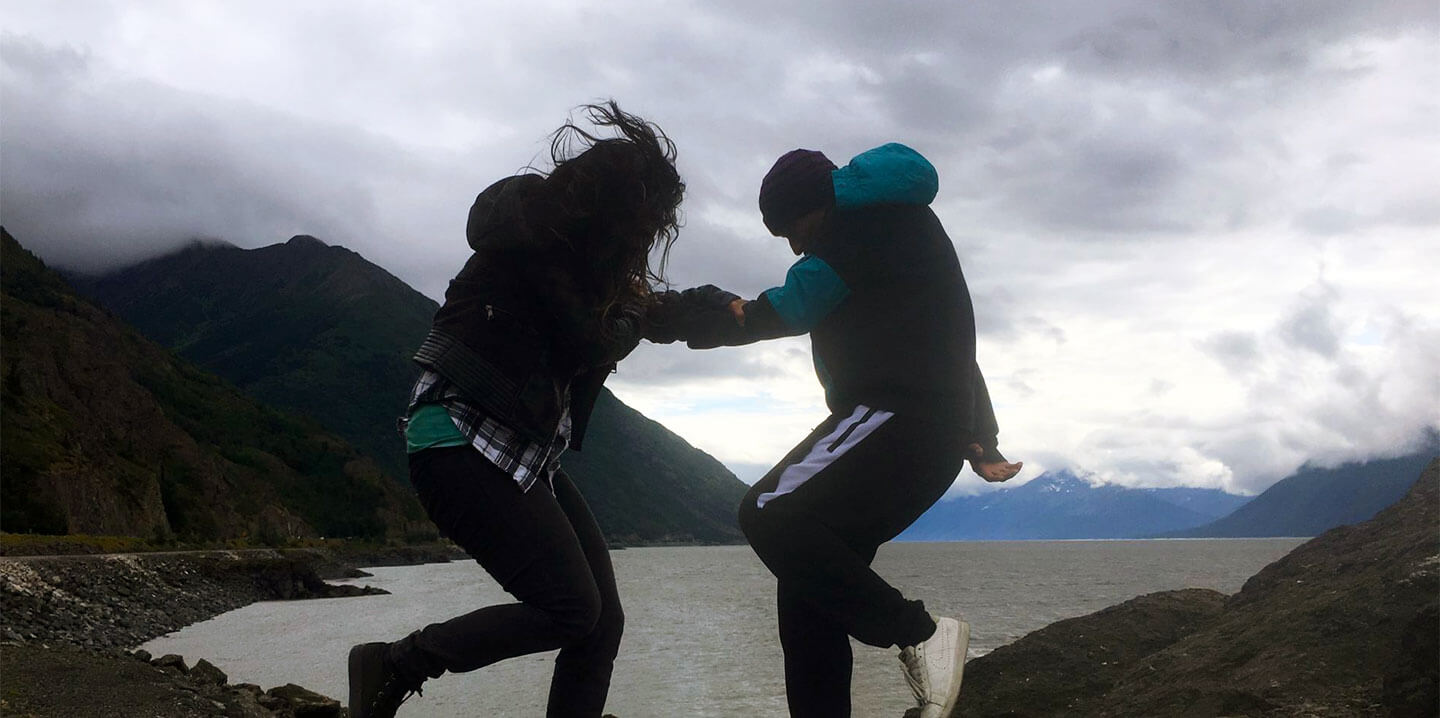 Dancers along the Turnagain Arm coast line in Alaska